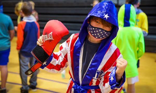 A boy dressed as a boxer
